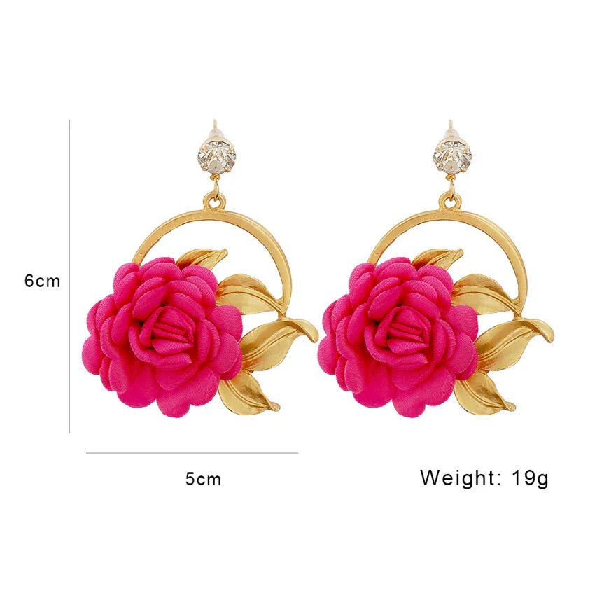 Elegant gold and pink floral drop earrings with crystal studs, measuring 6cm by 5cm, 19g weight