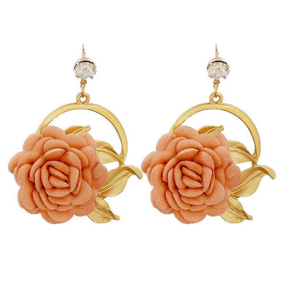 Gold-tone earrings with peach fabric rose flowers and leaf details, featuring clear crystal studs