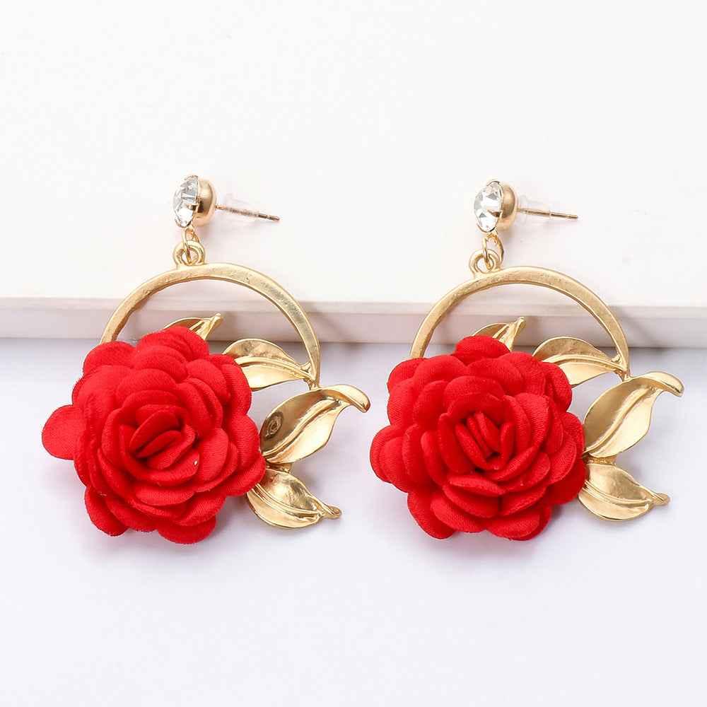 Red rose flower earrings with gold-tone leaves and hoop design on white background